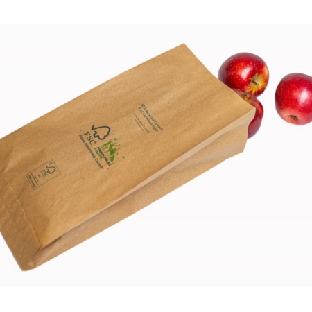 Paper produce bags with apples falling out of paper bag